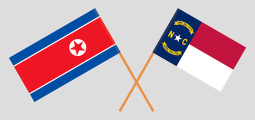 Crossed flags of North Korea and The State of North Carolina. Official colors. Correct proportion