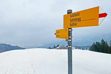 Hiking markings and orientation signs with signposts for navigating in the Wagital valley (Waegital or W&auml;gital) and alpine Lake Wagitalersee (W&auml;gitalersee), Innerthal - Canton of Schwyz, Switzerland