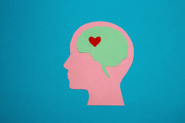 pink pink head blue brain and in it a little red heart, love that is deep in our head, waiting to be awake,creative design about human emotions