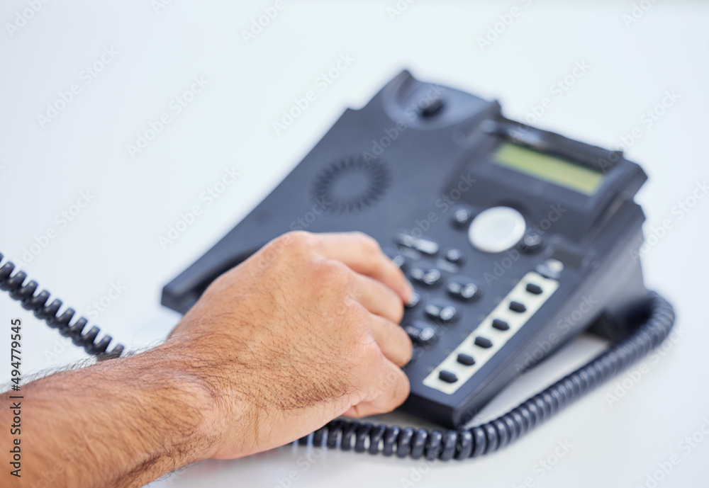 Poster a little trip into the past. shot of a businessman using a telephone to make a call.