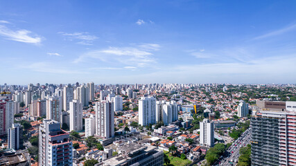 Fototapeta premium Aerial view of the city of São Paulo, Brazil. In the neighborhood of Vila Clementino, Jabaquara. Aerial drone photo. Avenida 23 de Maio in the background. Residential and commercial buildings