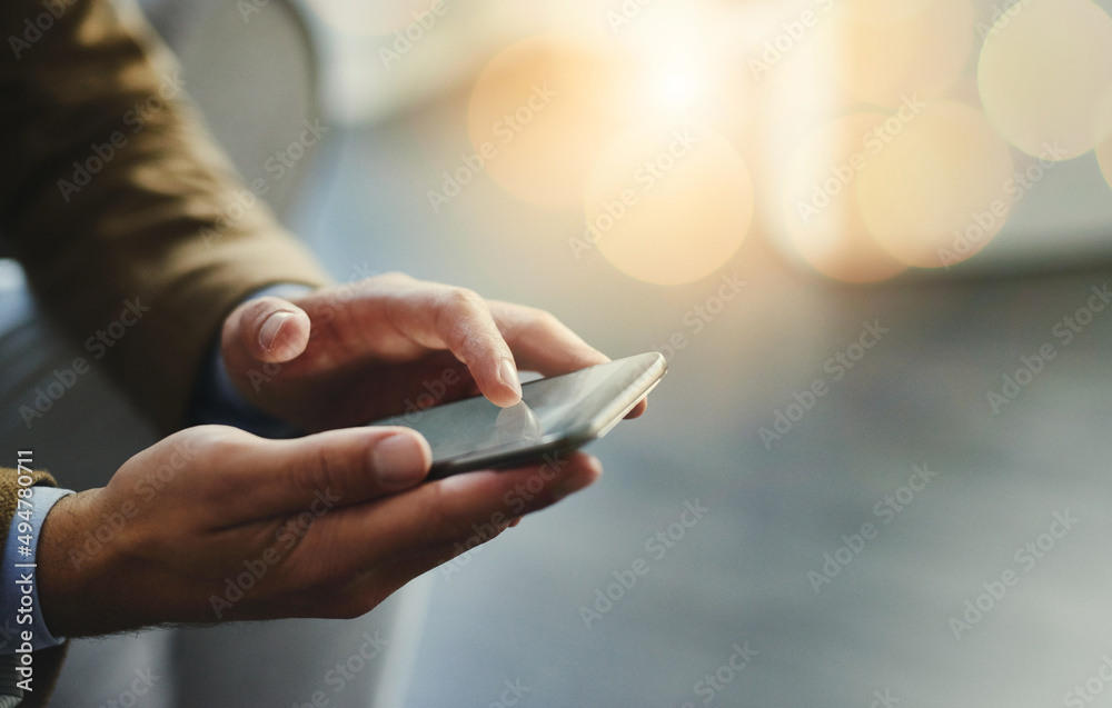 Poster Wireless is the way to go. High angle shot of an unrecognizable businessman using a mobile phone.