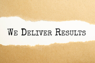 Fototapeta na wymiar We deliver results message written under torn paper. Business