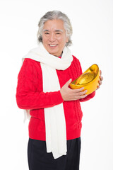 older persons holding a gold ingot