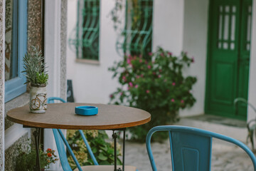 A table and chairs on the terrace.