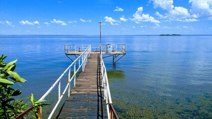 wooden bridge over lake