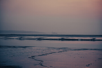 Glastonbury Town, old castle ruins, and Glastonbury Tor. English County in Somerset.