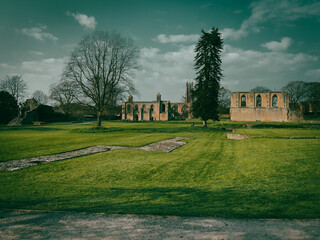 Glastonbury Town, old castle ruins, and Glastonbury Tor. English County in Somerset.