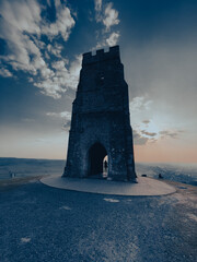 Glastonbury Town, old castle ruins, and Glastonbury Tor. English County in Somerset.