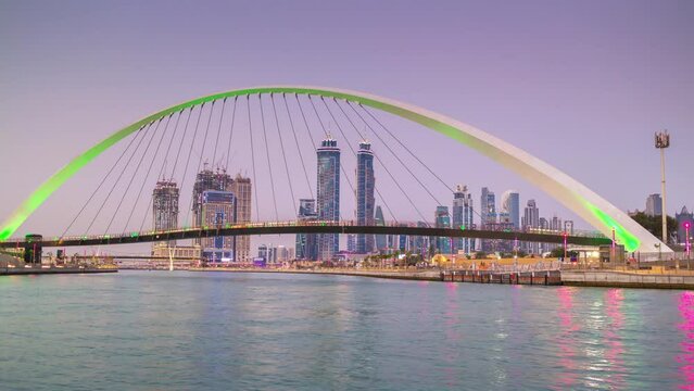 sunset twilight dubai creek downtown pedestrian crossing bridge panorama 4k time lapse uae