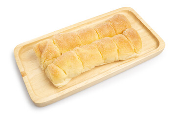Rows of Soft Buttered Bread topping with sugar served on wooden tray isolated on white background. Clipping path.