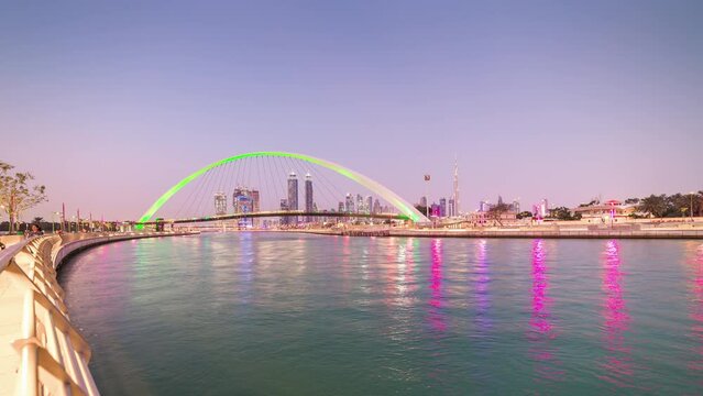 dubai canal walk sunset sky pedestrian crossing bridge downtown panorama 4k time lapse uae