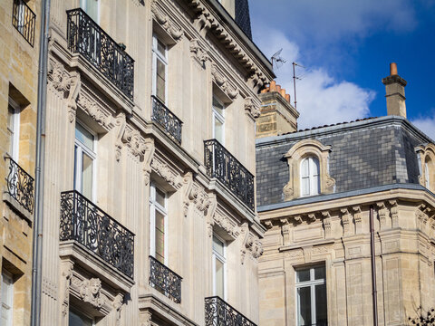 Typical Haussmann style facades, from the 19th century, traditional in the city centers of French cities such as Paris, Bordeaux and Lyon, with their traditional stone facades and windows...