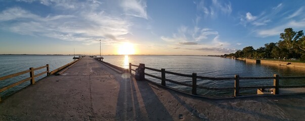 Muelle de pescadores de Chascomus. Atardecer en la Laguna de Chascomus. © cko32