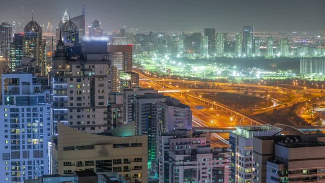 Dubai luxury residential district with golf club night timelapse.