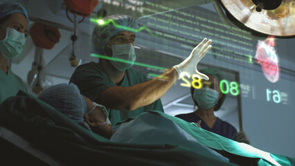 Futuristic operating room simulation - a surgeon diagnosing a senior woman's heart problem via a...
