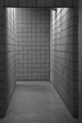 Black and white monochrome of grunge cement wall hallway