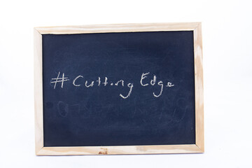 The term #CuttingEdge written on a blackboard