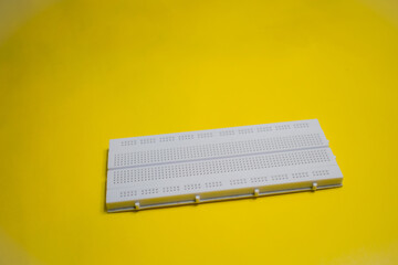 electronic breadboard for experiments isolated on a plain background 