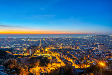 The skyline of Barcelona in Spain before sunrise