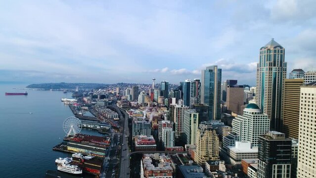 Orbiting aerial view of Seattle's waterfront in 2017 with the Viaduct still standing.