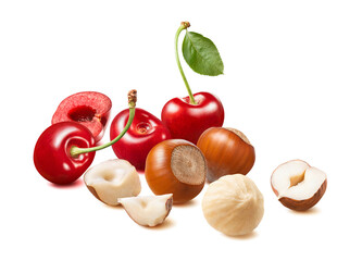 Red sweet cherries and hazelnuts isolated on white background. Nuts and berries mix