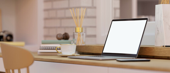 Close-up, Minimal office desk or worktable with notebook laptop.
