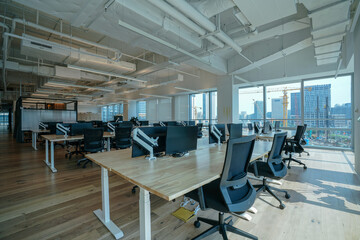 Interior of modern empty office building.Open ceiling design.