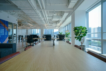 Interior of modern empty office building.Open ceiling design.