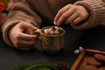 Fototapeta na wymiar Close-up, image, Woman enjoy having a hot chocolate milk