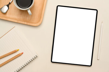 Digital tablet mockup, stationery and breakfast set on white table.