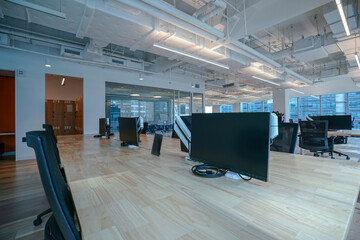 Interior of modern empty office building.Open ceiling design.