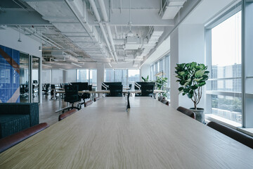 Interior of modern empty office building.Open ceiling design.