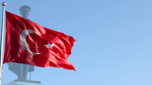 Ataturk Monument and Waving Turkish Flag. National days or holidays of Turkey. Zafer Bayrami or victory day, Ataturk'u anma, genclik ve spor bayrami or Commemoration of Ataturk, Youth and Sports Day.