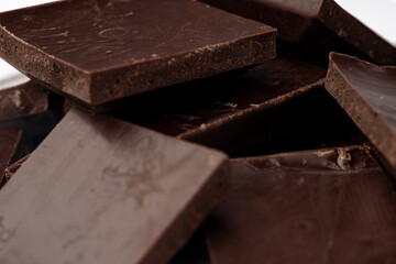 Milk chocolate bars stack for background, close up