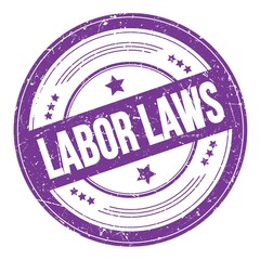 LABOR LAWS text on violet indigo round grungy stamp.