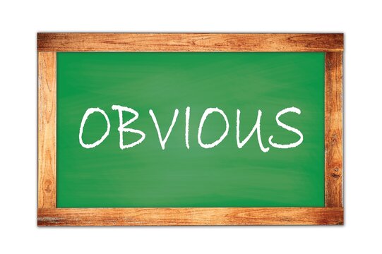 OBVIOUS text written on green school board.
