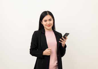 Fototapeta premium Cheerful young Asian woman using smartphone and checking message on mobile chat application isolated white background. Fashion style asian lovely woman playing game or shopping online by cellphone