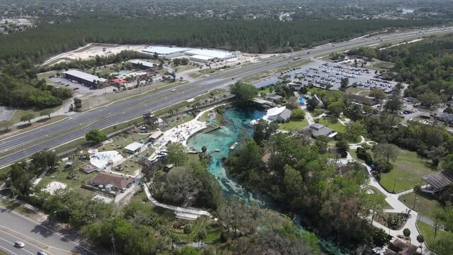 aerial of the beautiful natural spring at Weeki Wachee Springs State Park, home of the original mermaid shows and amusement rides.  Old-time Florida tourist attraction