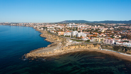 wide view of city and ocean at beach of "bico" in Estoril