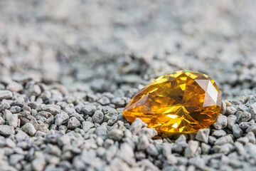 Natural Sapphire gemstone, Jewel or gems on black shine color, natural yellow gemstones on stone