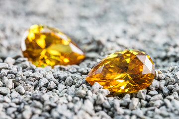 Natural Sapphire gemstone, Jewel or gems on black shine color, natural yellow gemstones on stone