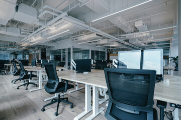 Interior of modern empty office building.Open ceiling design.