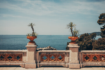 view of the miramare castle park by the sea in trieste - obrazy, fototapety, plakaty