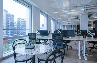 Interior of modern empty office building.Open ceiling design.