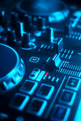Obraz na płótnie Canvas DJ mixing desk turntable
