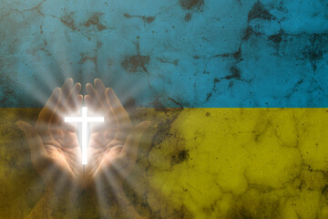 Hands in prayer. Prayer for Ukraine. Ukrainian flag. Prayer for the whole world
