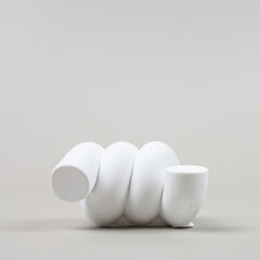White plaster in various shapes separate from the background