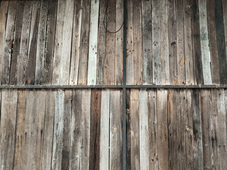 Wood background texture, Textured wooden background, dark gray and brown old wooden walls with black iron and wire elements.