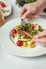 Grilled octopus sprinkled with fresh spices